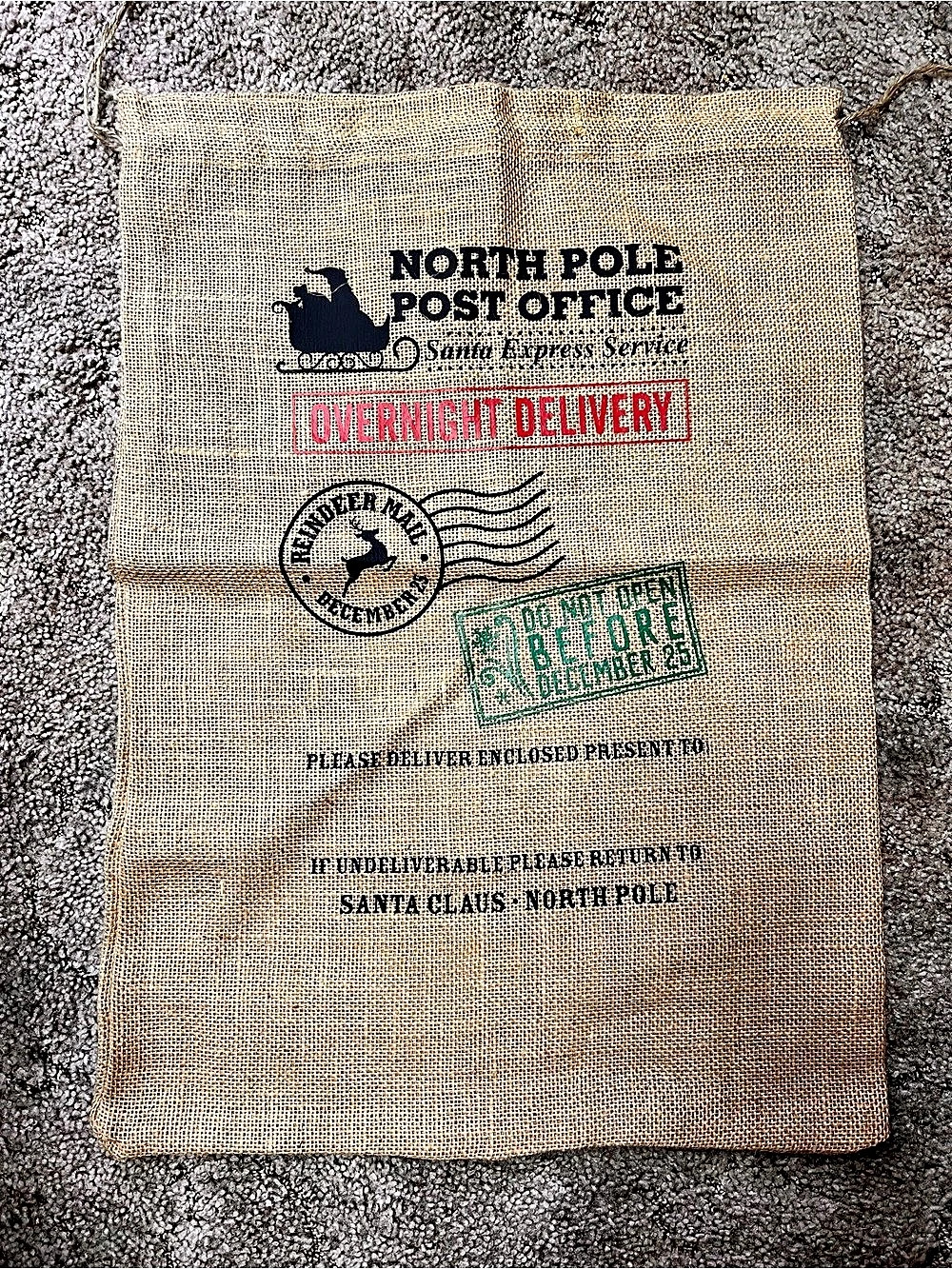 North Pole Post Office Burlap Santa Sack, Brown
